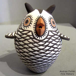 Owl in brown and orange on white