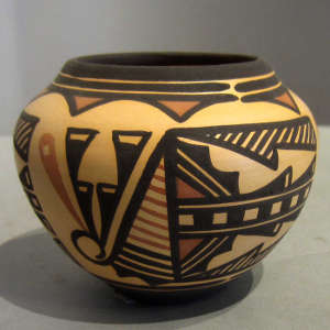 Traditional designs on a polychrome water jar