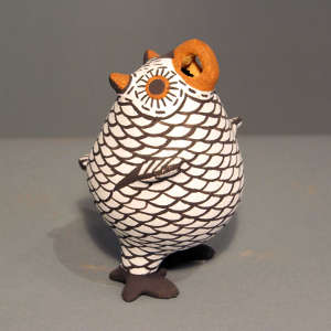 Owl figure standing