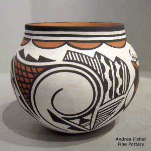 Deer, heart line and geometric design on a polychrome jar