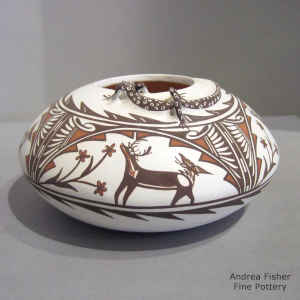 Polychrome jar with lizard, butterfly, deer-in-his-house and geometric design