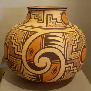 Mating eagle and geometric design on a large polychrome storage jar
