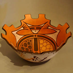 Frog design inside and dragonfly design outside on a polychrome prayer bowl